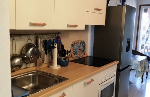 Pinarellu Apartment | Three-room apartment with sea view, garden and parking space.