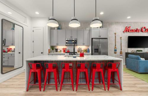 Katie Hill Neighborhood House | The Americana Abode Rooftop Hot Tub Game Room
