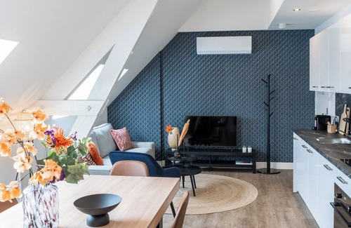 Municipality of Tilburg Apartment | The apartment features two luxuriously appointed bedrooms.