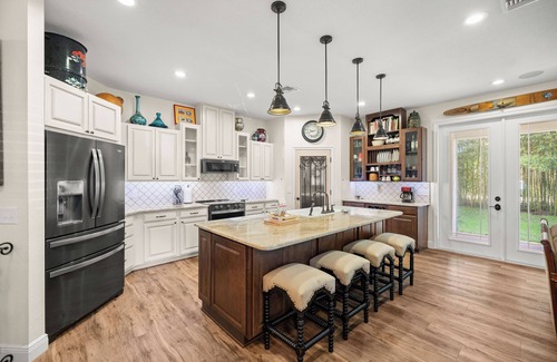 Candler House | The "Augustine". A newer home curated with BOLD eclectic Spaniard antiquity.