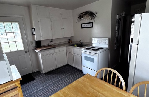 Shell Lake Cabin | The beach is calling.right outside your window. come relax and play!