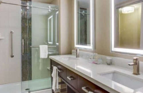 Hitch Village - Fred Wessels Homes House | The Best Suite Living! Perfect for Work or Leisure