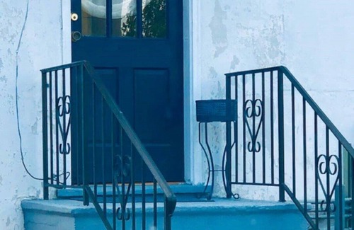 Old Town Winchester Apartment | The Blue Door steps from Handley Library