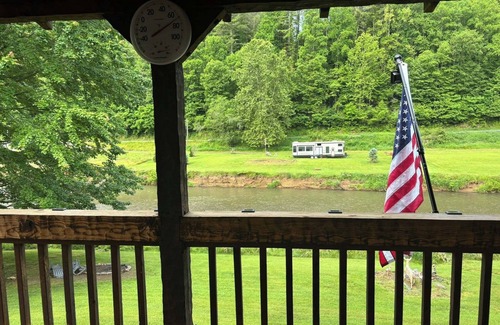 Lansing Cabin | The Boatright Retreated nestled on the river.
