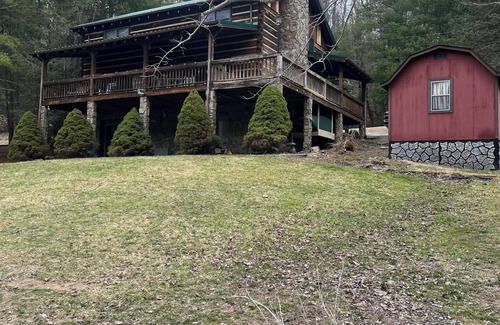 Lansing Cabin | The Boatright Retreated nestled on the river.