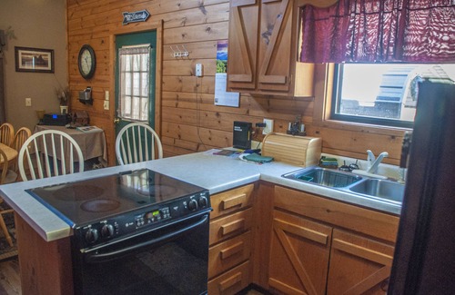 Blairsville Cabin | The Cabin Cove Pet Friendly cabin with creek frontage. 3 bedroom, internet