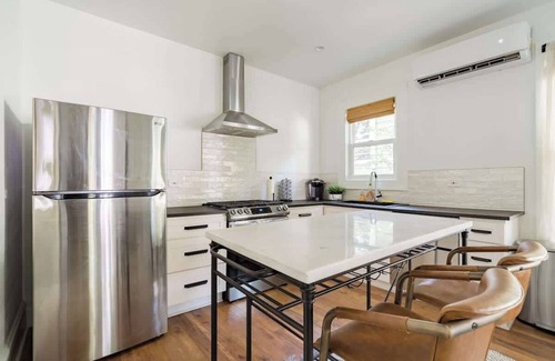 Uptown Apartment | The Calin Suite - Posh Local Boutiques & Eateries