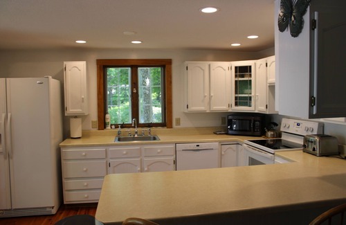 Harrison House | "THE CALLING LOON". A sunny 5 bedroom, 2 bath house on Crystal Lake! Sleeps 9.
