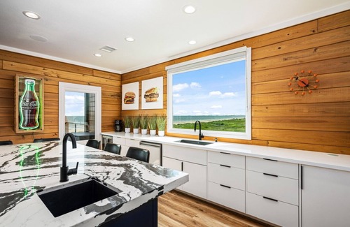 Crystal Beach House | The Coppertone Beach House - Where modern luxury meets the beach!