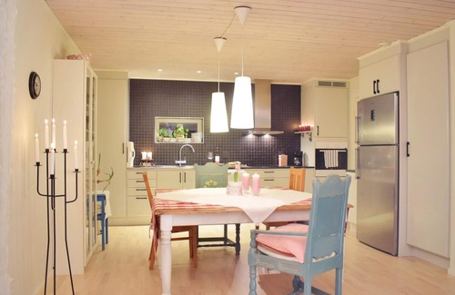 Angelholm House | The cottage is located on a hill where there used to be a windmill.