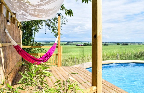 Angelholm House | The cottage is located on a hill where there used to be a windmill.