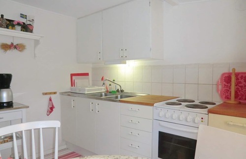 Hastveda House | The cozy cottage is located on a large, sheltered plot near the river Helgå.