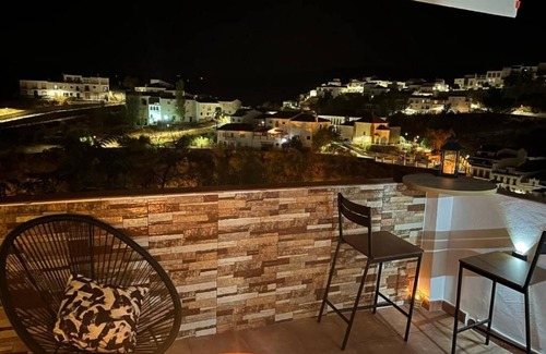 Setenil de las Bodegas Apartment | The curtains
