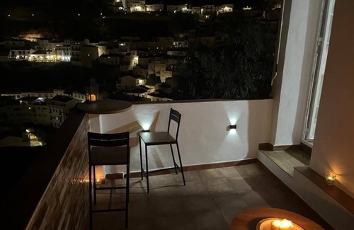 Setenil de las Bodegas Apartment | The curtains