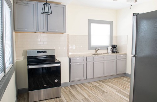 Downtown Niagara Falls House | The Eastside Manor - Private Yard & Parking, Near Falls & Casino by Niagara Hospitality