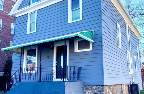 Downtown Niagara Falls House | The Eastside Manor - Private Yard & Parking, Near Falls & Casino by Niagara Hospitality
