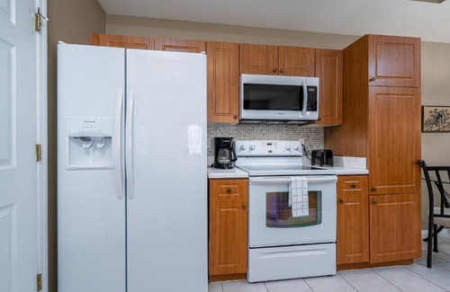 McGregor House | The Enclave at College Point # 22-08 - 9055 Colby Dr Unit Buildi by Coastal Vacation Properties