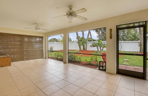 Fort Pierce House | The golden palm by the river