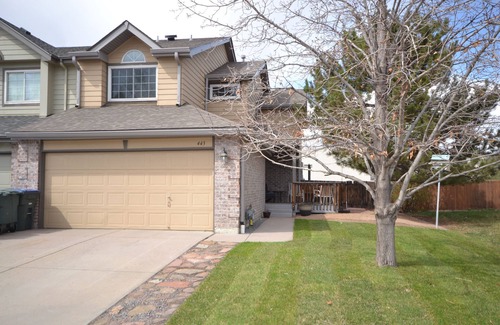 Northglenn House | The "Grandest Little Home" with Garage, 2 Decks, Sun Room, and 2 Person Hot Tub