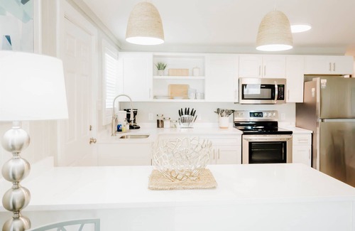 Surf City Apartment | The Hideaway A- Beach - Dog Friendly - Playset - Bikes - Fenced in Yard