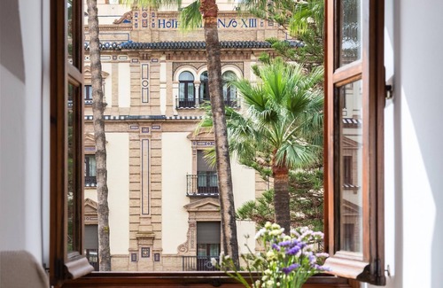 Santa Cruz Apartment | The house of San Fernando with views to Alcázar Gardens and Giralda