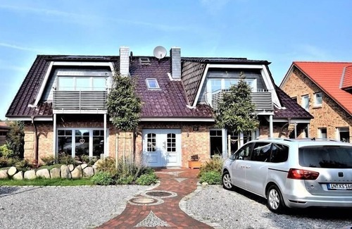 Hohwacht Apartment | The house Ostseeliebe with 4 apartments is located in the new residential/holiday area Kra