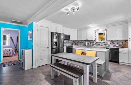 Tranquil Harbour House | The Island House is close to the beach with pool table and hot tub.
