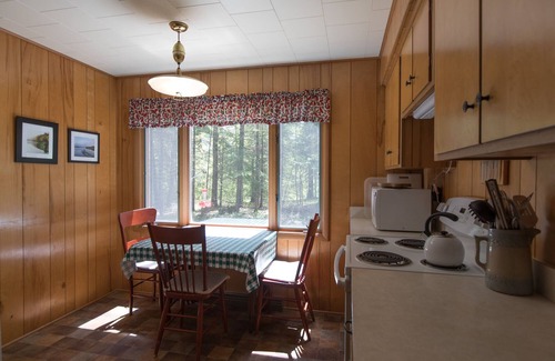 Presque Isle House | The Keith Farm Cabin, right on peaceful BIG Lake -48 acres!