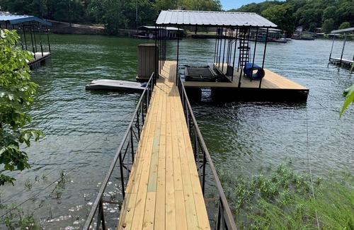 Sunrise Beach House | The Lazy Loft: Private dock, boat slip, ramp. And storage