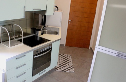 Kato Stalos Apartment | The "LifeGuard" Seafront Luxury Flat, 15meters from beach!