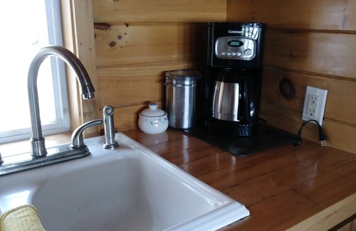 Orland Cottage | The loons are calling you! Your peaceful, waters edge retreat awaits!