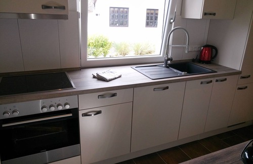 Busumer Deichhausen House | The lovingly furnished "Dünenhus", close to the beach. Vacation like at home.