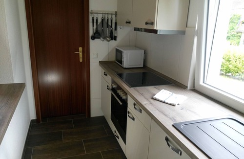 Busumer Deichhausen House | The lovingly furnished "Dünenhus", close to the beach. Vacation like at home.