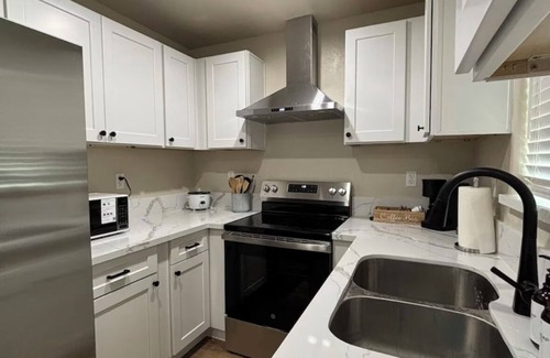 Raisin House | The Mini Stone House - 2-bedroom house near Airport.