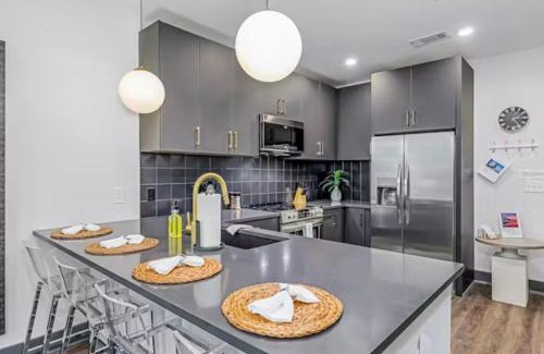 Rolling Mill Hill Apartment | The MUSE Emerald Isle Downtowns Favorite Condo by SkyRun Nashville