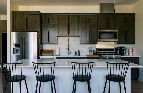 Traverse City Condo | THE NEST: Penthouse, Huge Balcony, Free Parking, Memories