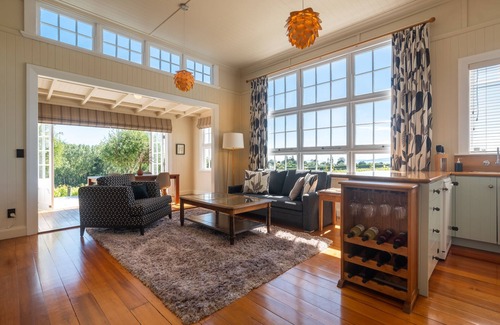 Tasman Cottage | The Old Schoolhouse - Historic Vineyard Accommodation with Stunning Sea Views