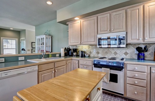Ocean Isle Beach Cottage | The Perfect Getaway! Dock, King Suite, Pet & Family Friendly