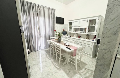 Carosino House | The pink corner is a facility located in a small town a few kilometers from the sea