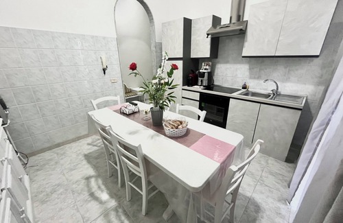 Carosino House | The pink corner is a facility located in a small town a few kilometers from the sea