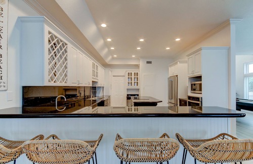 Belleair Beach House | The Pink Palace- Gulf front townhouse with private pool & large patio, sleeps 12