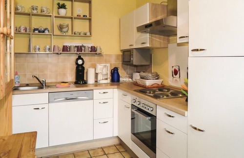 Utgast House | The semi-detached house, which is used exclusively as a vacation home, is located in a quiet side st