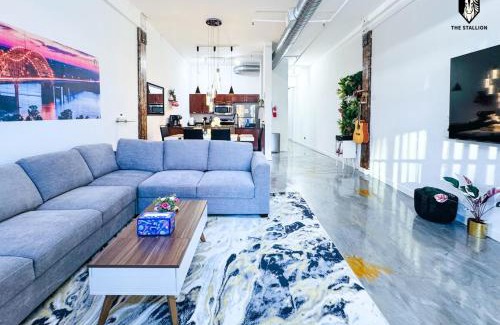 Downtown Memphis Apartment | The Stallion #103 - Walk to Attractions - Modern 2BD Loft in Downtown with Patio