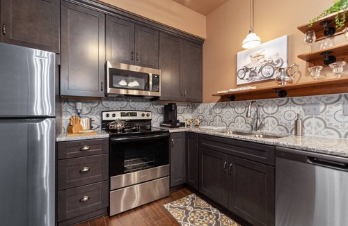 Wichita Apartment | The Sunflower Loft is located 1 block from Old Town in a 2 story brick building.