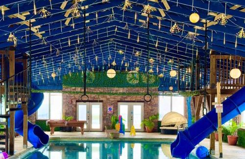 Bryant Apartment | The Yurt at Paradise Pointe with a hot tub fire pit & Grill