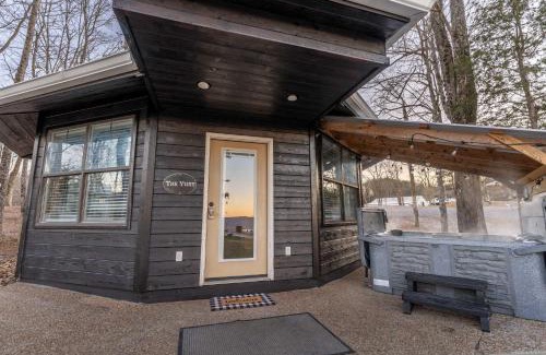 Bryant Apartment | The Yurt at Paradise Pointe with a hot tub fire pit & Grill
