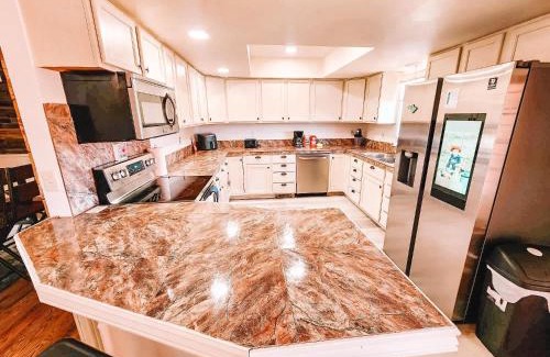 Briargate Villa | Theater Room Pet Friendly Near AF Academy Peaceful