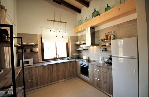 Son Antem House | They are Pieres Nou. modern rustic finca with volley ball court and 15m pool