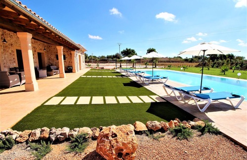 Son Antem House | They are Pieres Nou. modern rustic finca with volley ball court and 15m pool