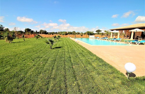 Son Antem House | They are Pieres Nou. modern rustic finca with volley ball court and 15m pool